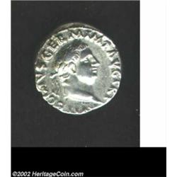 Vitellius, 69 A.D., AR denarius (3.42 g). Laureate head right/ Vesta, holding patera, scepter, seate