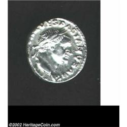 Vespasian, 69-79 AD, AR denarius, (3.4 gm.) Laureate head right/Judaea seated right at foot of troph