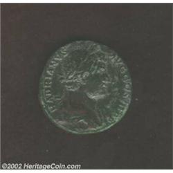 Hadrian, 117-138 A.D., AE sestertius (24.44 g). Laureate, draped bust right/ Emperor, raising right.