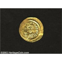 Maurice Tiberius, 582-602 A.D., AV solidus (4.44 gm.), Constantinople mint. Facing bust holding glob