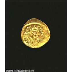 Phocas, 602-610 A.D., AV solidus (4.49 gm.), Constantinople mint. Facing bust, draped, cuirassed, we