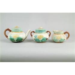 MAJOLICA: THREE PIECE TEA SET IN THE POND LILLY AND ROPE PATTERN ATTRIBUTED TO SAMUEL LEAR…