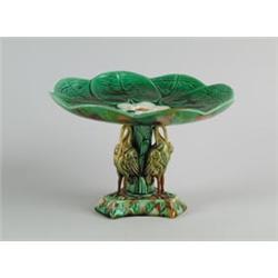 MAJOLICA: CAKE STAND IN THE POND LILLY PATTERN ATTRIBUTED TO GRIFFIN, SMITH & CO…