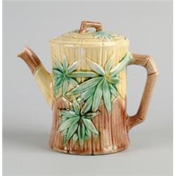 MAJOLICA: TEAPOT IN THE BAMBOO MOTIF BY THE GRIFFEN, SMITH & CO…