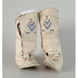 PAIR OF CROW WOMAN’S BEADED WRAP AROUND BOOT MOCCASINS…