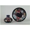 Image 1 : TWO PIECES OF DECORATED MOORCROFT POTTERY…