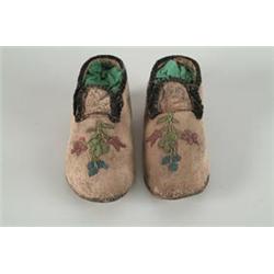 PAIR OF BLACKFOOT/PLAINS BEADED MOCCASINS…