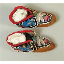 PAIR OF EASTERN WOODLANDS BABY MOCCASINS…