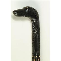CARVED EBONY AND IVORY DOG HEADED CANE…