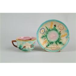 MAJOLICA: MUSTACHE CUP AND SAUCER…