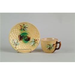 MAJOLICA: CUP AND SAUCER…