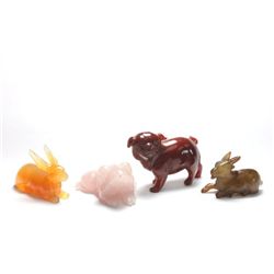 4 stone animals