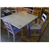 Image 1 : Drop leaf table and four chairs.