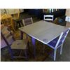Image 2 : Drop leaf table and four chairs.