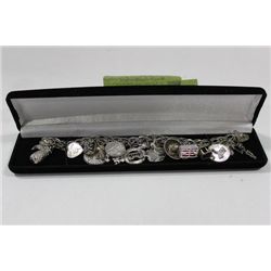 ESTATE VINTAGE ST SILVER CHARM BRACELET
