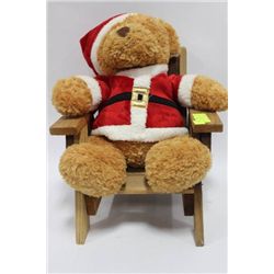 CHRISTMAS TEDDY BEAR SITTING IN WOODEN LOUNGE
