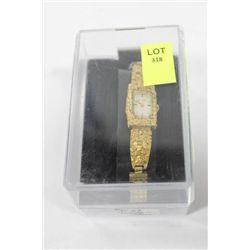 LADIES BULOVA W/ UNIQUE GOLD ACCENTS WINDING WATCH
