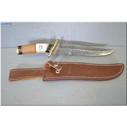 F. Normen Bowie style Knife w/forged damascus pattern blade, brass hilt, multi colored materials in 
