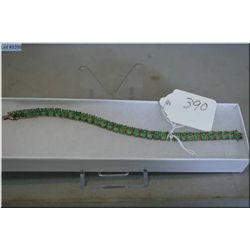 Ladies Silver Bracelet ( stamped 925 Silver ) set w/68 oval shaped cut emeralds , approx. 38 cts., c