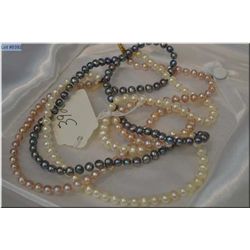 Fresh Water Pearl Triple Strand Necklace w/accented w/14 Kt gold clasp