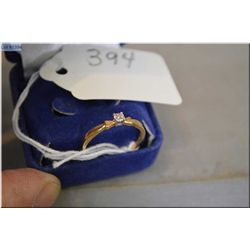 Ladies Gold Engagement Ring , Stamped 10 Kt w/single small diamond