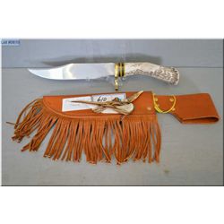Mule Deer Bowie Knife w/brass hilt, stag style handle, w/fringed leather sheath, w/decoration  SER #
