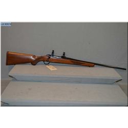 Ruger Mod M 77 .220 Swift cal bolt action Rifle w/24" bbl [ appears excellent, blue finish, no sight
