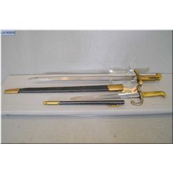 Lot of Two Bayonets w/scabbards : One possibly for Martini Henry Bladed Mkd India w/brass handle & h