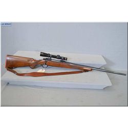 Ruger Mod M77 .338 Win Mag cal bolt action Rifle w/24" bbl [ blue finish, w/integeral bases, fitted 