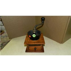 Primitive table top coffee grinder