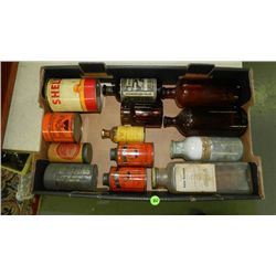 box of Primitive items including, advertising tins and