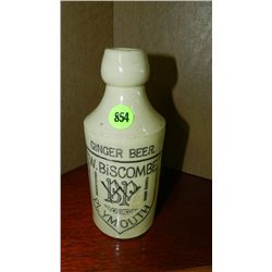 Primitive advertising stone crock ginger beer bottle