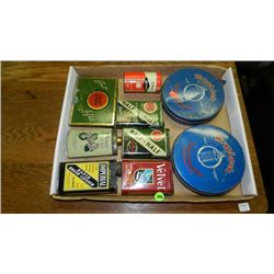 box of Primitive items including, advertising tins