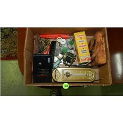 box of collectibles with tokens etc