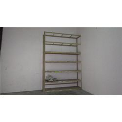 Shelving unit in room 7 shelves 8' tall