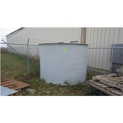 Fiberglass tank in corner of yard