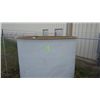 Image 2 : Fiberglass tank in corner of yard