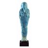 Image 1 : Ushabti. Baja época (alrededor del 664-323 a.C.). Fayenza color azul. Altura 17,5 cm. Incluye peana.