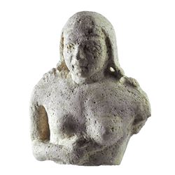 Parte superior de una estatua femenina (siglos V-III a.C.). Piedra caliza. Altura 13,7 cm. Incluye p