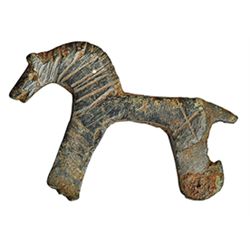 Fíbula en forma de equino. Siglos I-III d.C. Bronce. Longitud 4,1 cm.