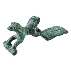 Fíbula en forma de doble león. Siglo III d.C. Bronce. Longitud 3,8 cm.