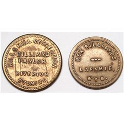 Two Wyoming billiards tokens