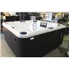 Image 1 : CAL SPAS ESCAPE SERIES LOUNGER HOT TUB, 8' X 8' PREFERRED SMOKE CABINET WITH GYPSUM INTERIOR C/W