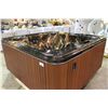 Image 1 : CAL SPAS CONNECT LOUNGER HOT TUB, 8'X8' PREFERRED MAHOGANY CABINET WITH AZURA INTERIOR C/W