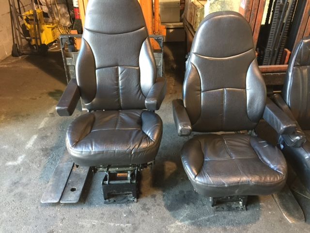 PAIR OF LEGACY SILVER BLACK LEATHER TRUCK SEATS