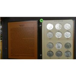 Nice complete album of US Silver Peace Dollars from