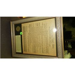 Framed declaration with US coins