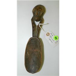 African carved spoon with face design