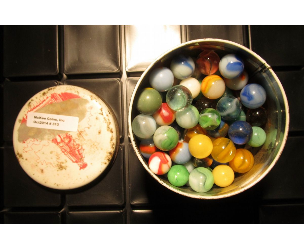 313. Large metal Tin full of Antique Marbles.