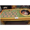 Image 2 : SMALL WOOD FRAMED ROULETTE TABLE WITH METAL BENCH